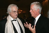 DGA Honoree Bertrand Tavernier and DGA President Michael Apted compare notes. (Photo by Evan Agostini/Getty Images)
