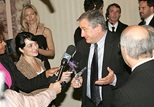 Robert De Niro speaks with members of the press.