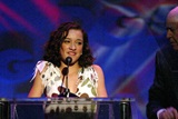 Young Oscar-nominee Keisha Castle-Hughes (Whale Rider) presents the award for Outstanding Directing in Comedy Series.