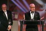 Writer/Comedian Buck Henry accepts the award on Nichols' behalf.