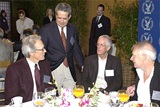 DGA National Executive Director Jay D. Roth (standing), greets 2003 Feature Film Nominee Clint Eastwood, DGA President Michael Apted and Nominee Peter Weir.