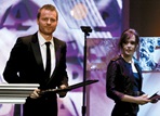 Nicolai Fuglsig accepts the DGA Commericals Award from presenter Ellen Page.
