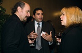 Nominee Yves Simoneau chats with guests at the post symposium reception. 