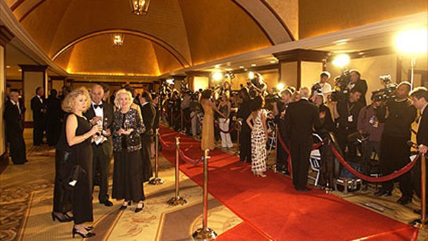 The red carpet at the Century Plaza Hotel is ready to receive the VIPs.